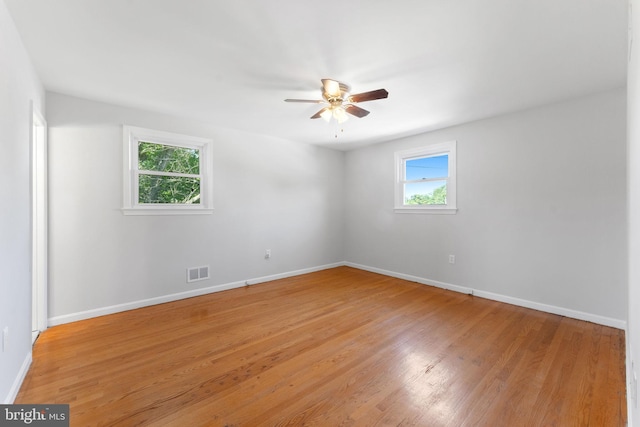 4503 Poppe Pl, Temple Hills, MD 20748 - spare room with a ceiling fan, baseboards, and light wood-style flooring