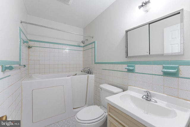 4503 Poppe Pl, Temple Hills, MD 20748 - bathroom with tile walls, toilet, vanity, and washtub / shower combination