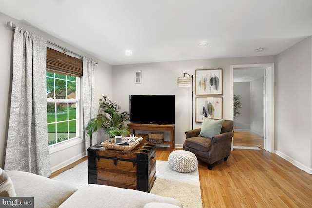 8588 King Carter St, Manassas, VA 20110 - living area with light wood-style flooring, baseboards, and recessed lighting