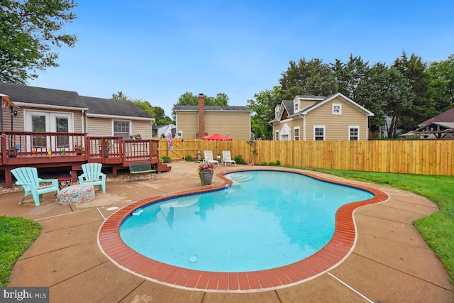 8588 King Carter St, Manassas, VA 20110 - view of pool with a wooden deck, a patio, and a fenced backyard