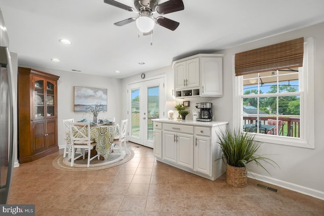 8588 King Carter St, Manassas, VA 20110 - dining area featuring healthy amount of natural light, baseboards, recessed lighting, and light tile patterned floors