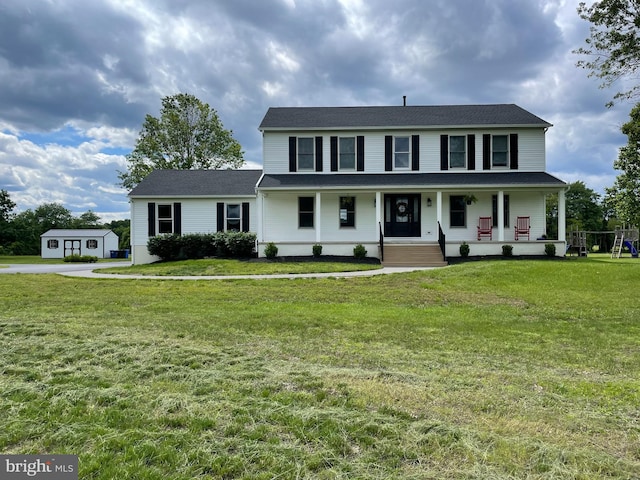 69 Eayrestown Rd, Medford, NJ 08055 - view of front of property featuring covered porch and a front lawn