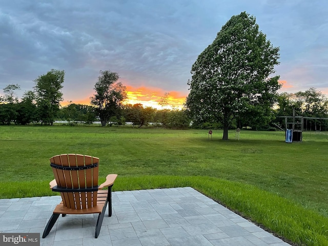 69 Eayrestown Rd, Medford, NJ 08055 - yard at dusk with a lawn and a patio