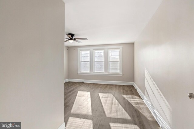 100 Chester Pike, Darby, PA 19023 - unfurnished room with a ceiling fan, baseboards, and wood finished floors