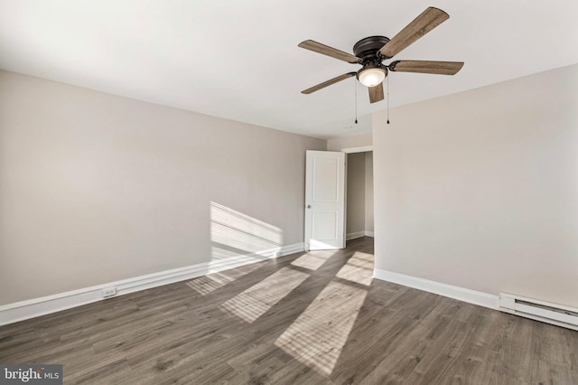 100 Chester Pike, Darby, PA 19023 - spare room with wood finished floors, ceiling fan, baseboards, and a baseboard radiator