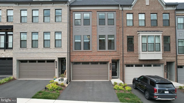 5163 Ridgeview Retreat Dr, Chantilly, VA 20151 - view of front of property featuring an attached garage, brick siding, and driveway