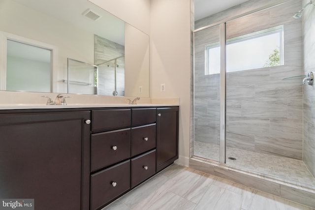 5163 Ridgeview Retreat Dr, Chantilly, VA 20151 - bathroom featuring double vanity, a stall shower, and marble finish flooring