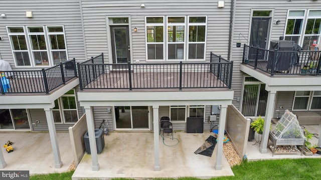 5163 Ridgeview Retreat Dr, Chantilly, VA 20151 - back of house with a patio and a balcony