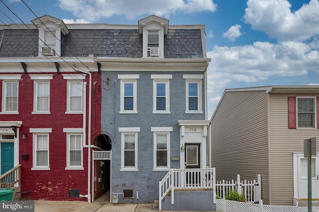 114 Walnut St, Columbia, PA 17512 - view of front of home featuring mansard roof and brick siding