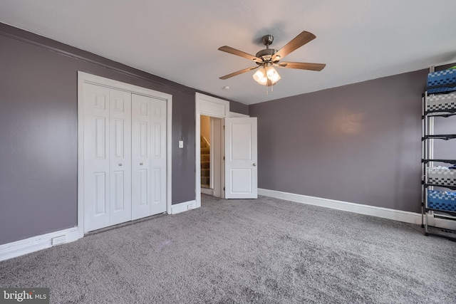 114 Walnut St, Columbia, PA 17512 - unfurnished bedroom featuring carpet flooring, baseboards, a closet, and a ceiling fan