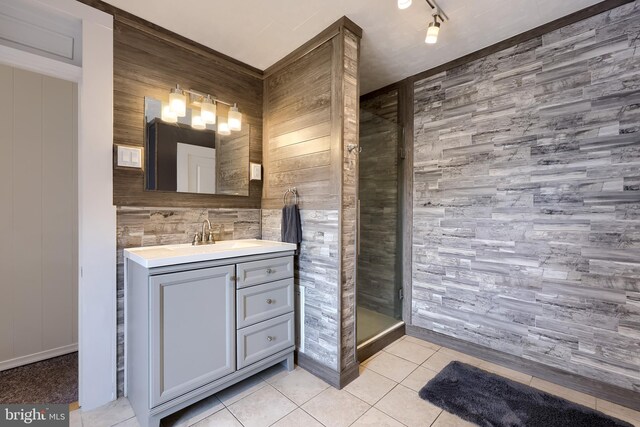 114 Walnut St, Columbia, PA 17512 - bathroom featuring a stall shower, vanity, tile patterned floors, a chandelier, and wood walls