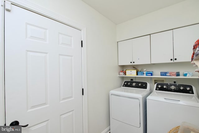 8919 Kiger St, Lorton, VA 22079 - washroom featuring cabinet space, washer and dryer, and baseboards