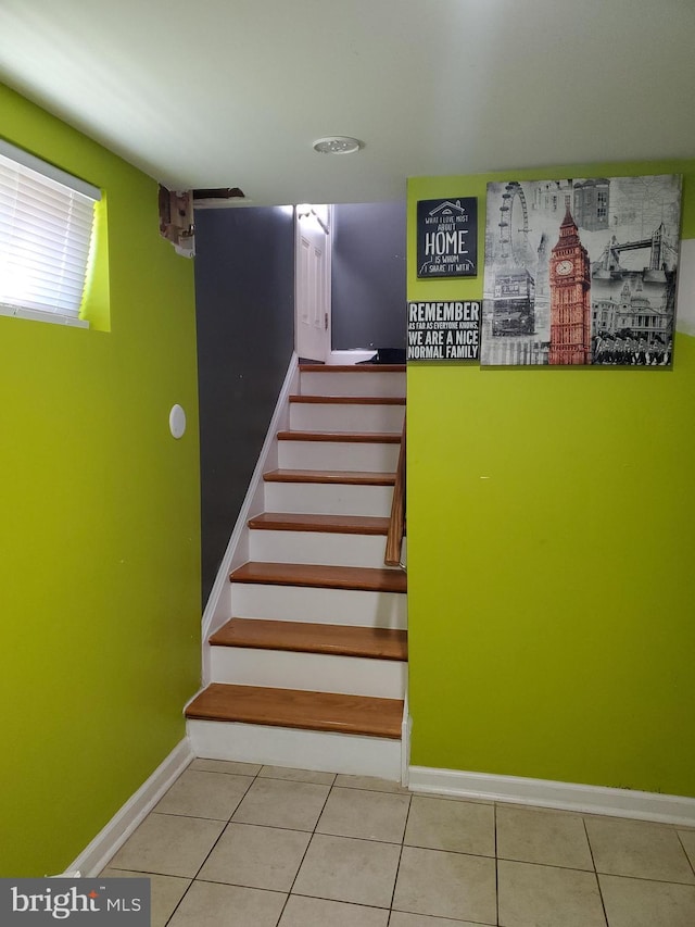 4905 66th Ave, Hyattsville, MD 20784 - stairway featuring baseboards and tile patterned flooring