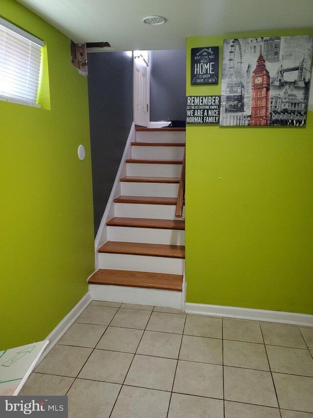 4905 66th Ave, Hyattsville, MD 20784 - stairs with baseboards and tile patterned floors