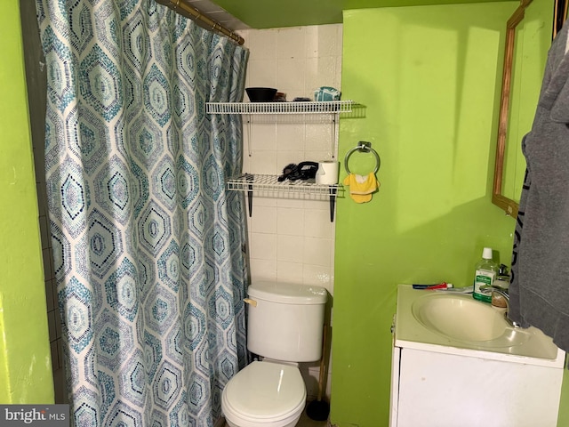 214 S 11th St, Reading, PA 19602 - bathroom featuring vanity, toilet, and curtained shower