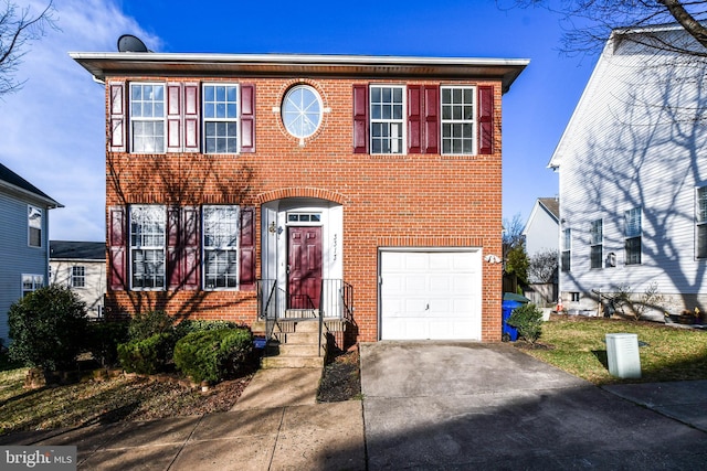 3313 Cornwell Dr SE, Washington, DC 20032 - colonial inspired home featuring concrete driveway, a garage, and brick siding