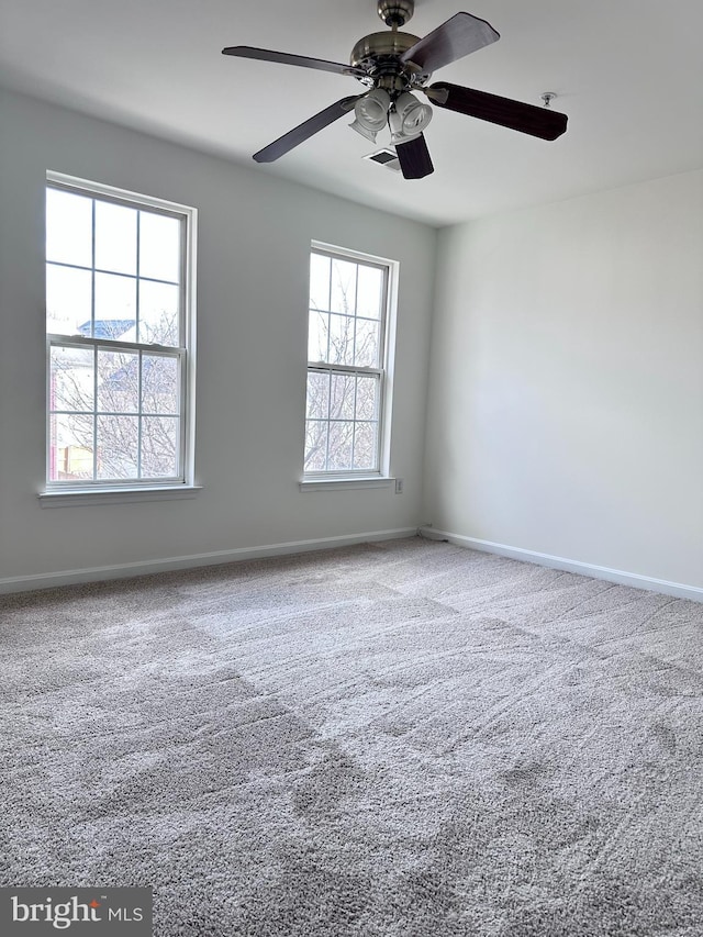 3313 Cornwell Dr SE, Washington, DC 20032 - carpeted empty room featuring a ceiling fan and baseboards