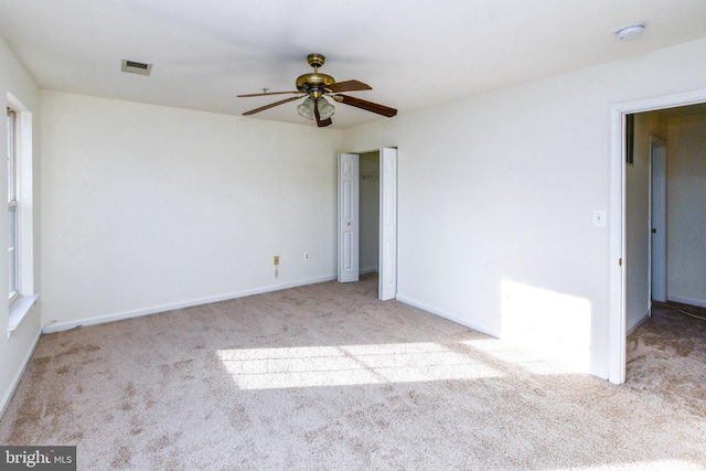 3313 Cornwell Dr SE, Washington, DC 20032 - carpeted empty room featuring a ceiling fan, baseboards, and a smoke detector