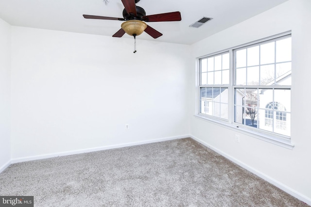 3313 Cornwell Dr SE, Washington, DC 20032 - empty room with carpet, baseboards, and ceiling fan