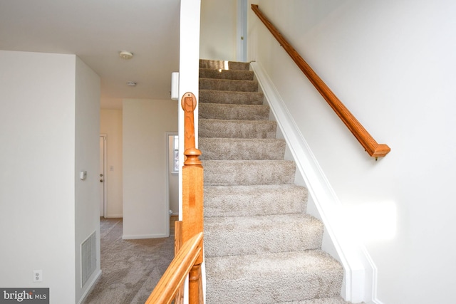 3313 Cornwell Dr SE, Washington, DC 20032 - stairway with carpet floors and baseboards