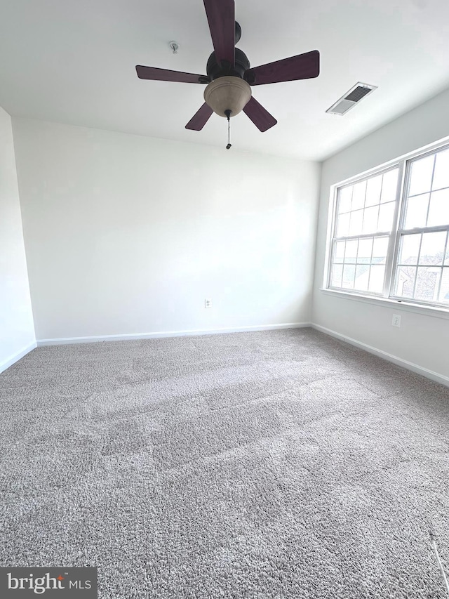 3313 Cornwell Dr SE, Washington, DC 20032 - carpeted spare room featuring baseboards, a ceiling fan, and a pendent fire sprinkler