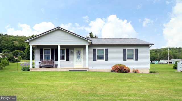 503 N Rachels Way, Aaronsburg, PA 16820 - view of front of house featuring a porch, a front lawn, and a shingled roof