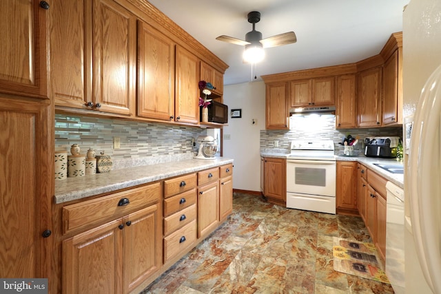 503 N Rachels Way, Aaronsburg, PA 16820 - kitchen featuring white appliances, under cabinet range hood, decorative backsplash, light countertops, and brown cabinetry