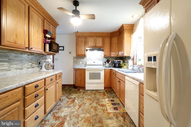 503 N Rachels Way, Aaronsburg, PA 16820 - kitchen with white appliances, under cabinet range hood, decorative backsplash, a sink, and stone finish flooring