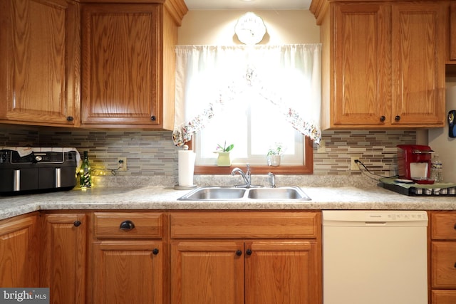 503 N Rachels Way, Aaronsburg, PA 16820 - kitchen featuring white dishwasher, a sink, light countertops, and backsplash