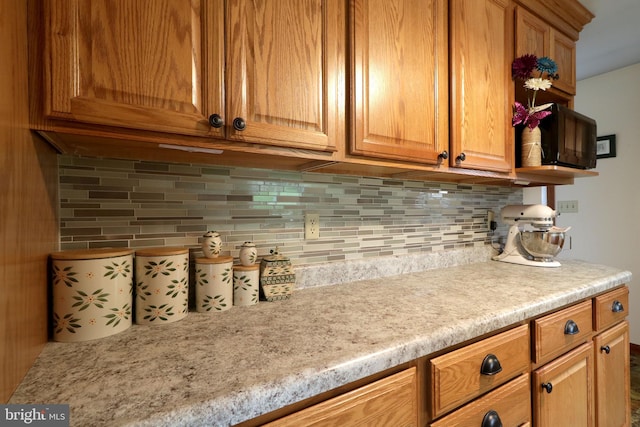 503 N Rachels Way, Aaronsburg, PA 16820 - kitchen featuring decorative backsplash and brown cabinets