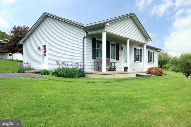 503 N Rachels Way, Aaronsburg, PA 16820 - view of property exterior with covered porch and a yard