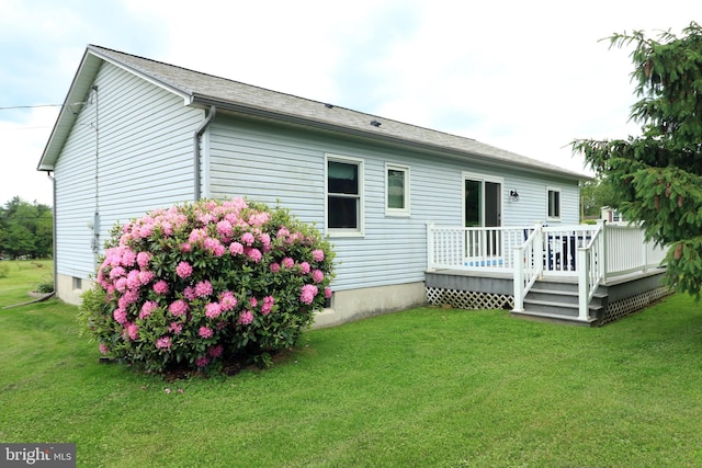 503 N Rachels Way, Aaronsburg, PA 16820 - rear view of house with a wooden deck and a lawn