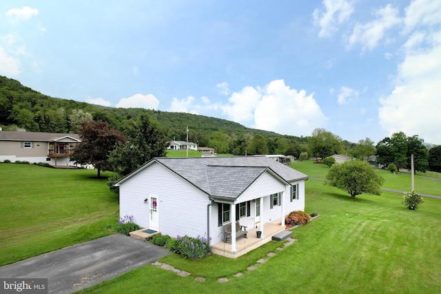 503 N Rachels Way, Aaronsburg, PA 16820 - view of property exterior with a lawn and a view of trees