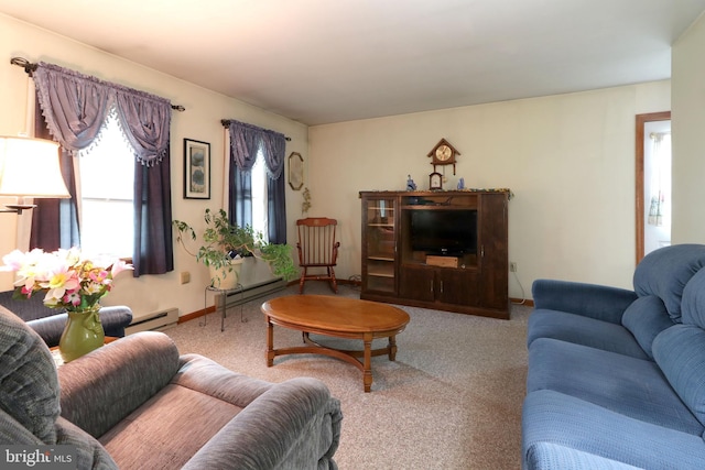 503 N Rachels Way, Aaronsburg, PA 16820 - living room featuring carpet floors, baseboard heating, baseboards, and a baseboard radiator