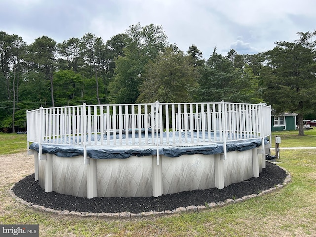 117 W Waverly St S, Browns Mills, NJ 8015 - view of swimming pool with a deck, a covered pool, and a forest view