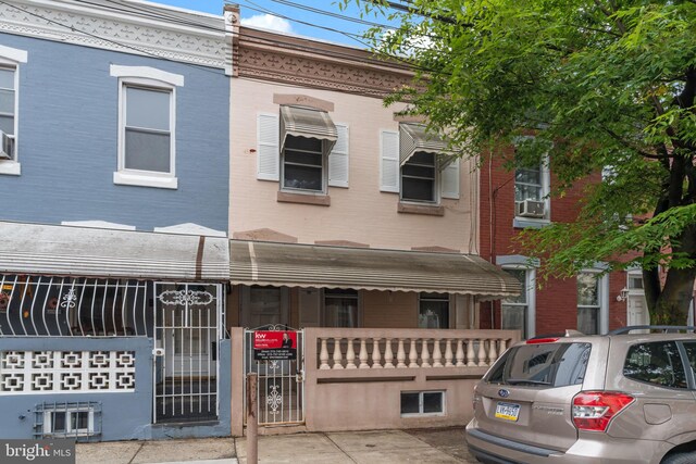 2531 N Lawrence St, Philadelphia, PA 19133 - multi unit property featuring a gate, a fenced front yard, and brick siding