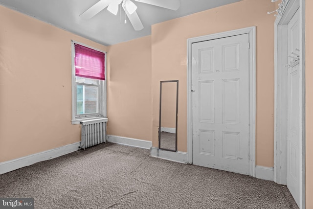 2531 N Lawrence St, Philadelphia, PA 19133 - unfurnished bedroom with radiator, carpet flooring, baseboards, and a ceiling fan