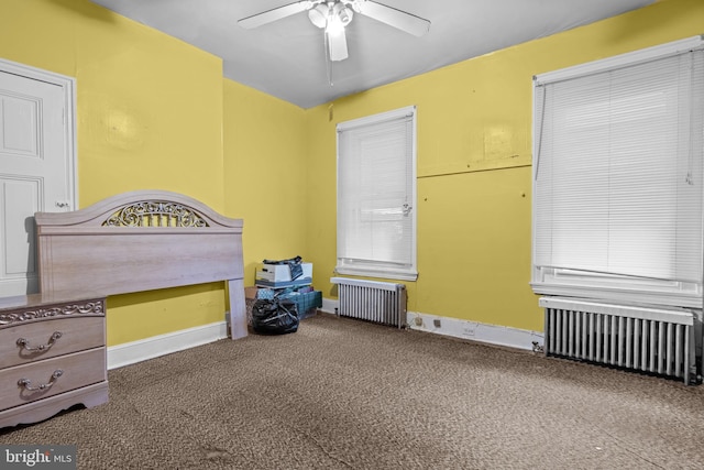 2531 N Lawrence St, Philadelphia, PA 19133 - unfurnished bedroom with radiator, carpet flooring, baseboards, and ceiling fan