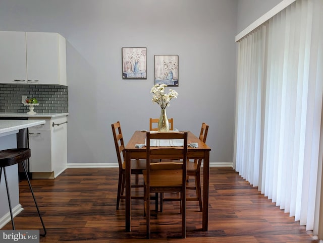 407 Talon Ct, Lawrence, NJ 08648 - dining area with dark wood finished floors and baseboards