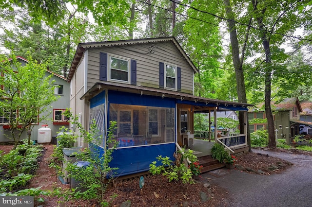 302 6th St, Mount Gretna, PA 17064 - view of front of home featuring a sunroom