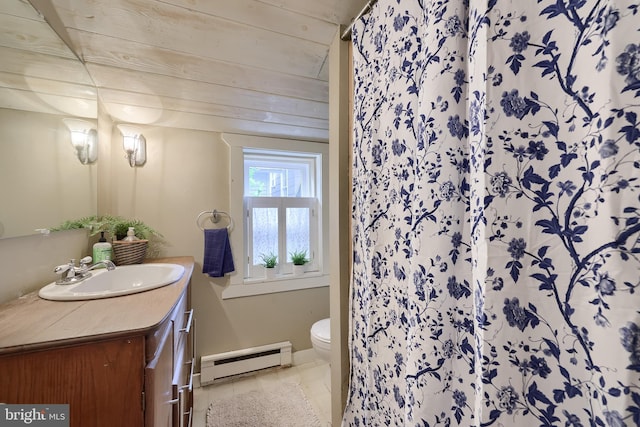302 6th St, Mount Gretna, PA 17064 - full bathroom featuring a baseboard radiator, vanity, toilet, and curtained shower