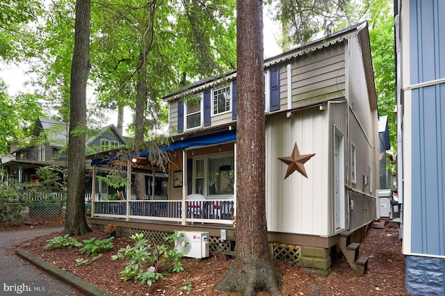 302 6th St, Mount Gretna, PA 17064 - view of front of house with a porch and a cooling unit
