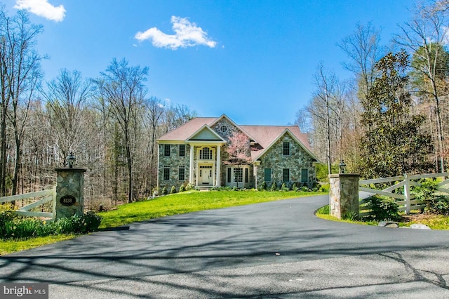 8138 Rondelay Ln, Fairfax Station, VA 22039 - view of front facade featuring stone siding and driveway