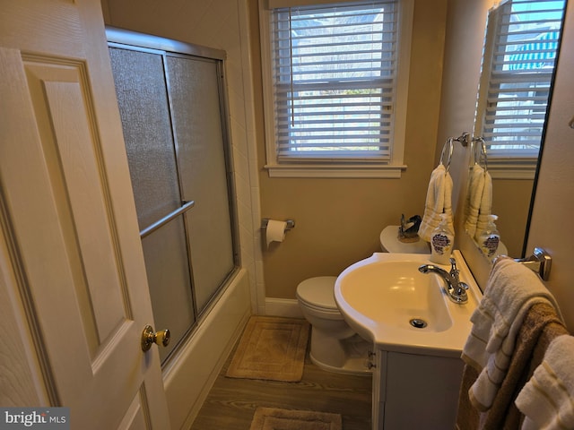 817 Lafayette Blvd, Brigantine, NJ 08203 - full bathroom featuring plenty of natural light, vanity, toilet, and combined bath / shower with glass door