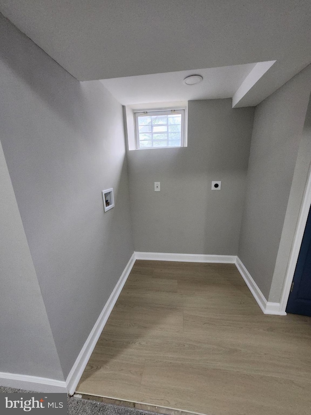 901 N Luzerne Ave, Baltimore, MD 21205 - laundry area featuring washer hookup, baseboards, wood finished floors, and hookup for an electric dryer