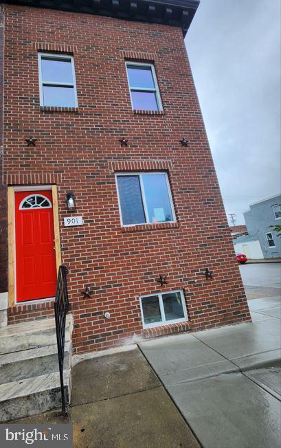 901 N Luzerne Ave, Baltimore, MD 21205 - view of front of property with brick siding