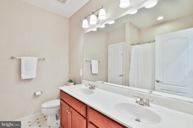 16328 Limestone Ct, Leesburg, VA 20176 - bathroom with double vanity, toilet, baseboards, and a shower with shower curtain