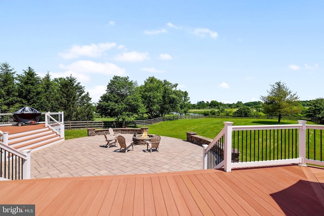 16328 Limestone Ct, Leesburg, VA 20176 - wooden deck with an outdoor fire pit, a patio area, and view of wooded area