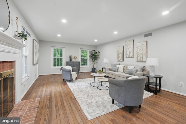 2624 Black Fir Ct, Reston, VA 20191 - living room featuring a fireplace, hardwood / wood-style flooring, baseboards, and recessed lighting