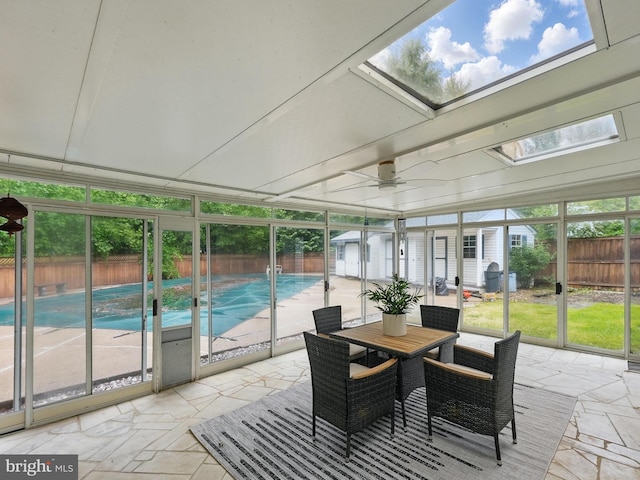 2624 Black Fir Ct, Reston, VA 20191 - sunroom featuring a skylight, ceiling fan, and outdoor dining space